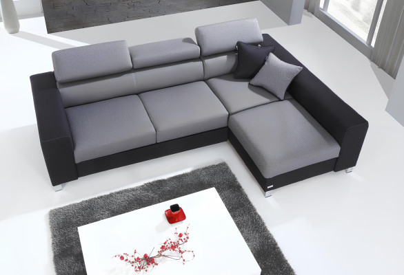 Muotoiltu L-muotoinen sohva modernilla vuodemahdollisuudella