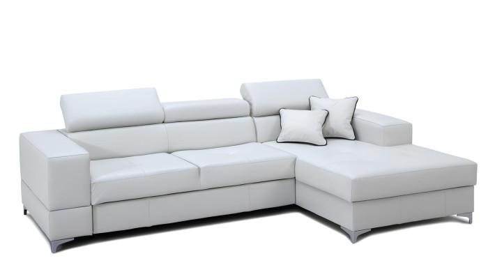 Moderni L-muotoinen kangassohva, jossa on säilytystila sängylle