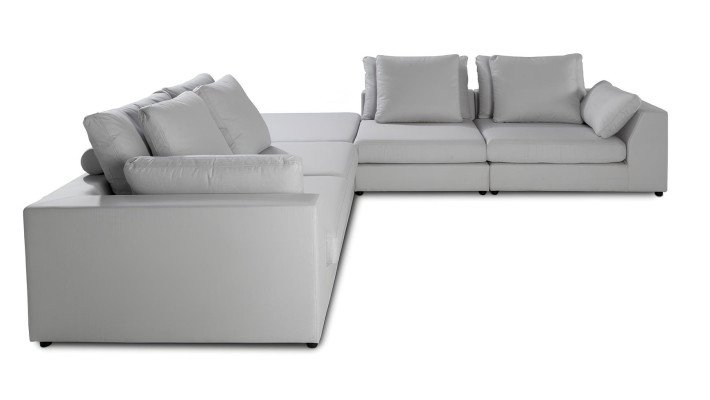 Moderni L-muotoinen kulmasohva valkoisesta materiaalista