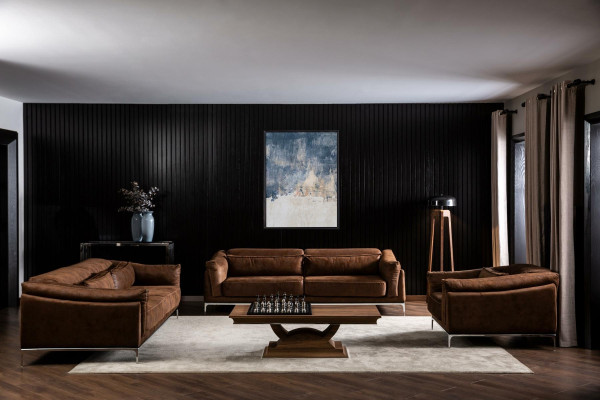 Kolmehenkinen sohva pehmeällä ruskealla sametilla