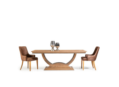 Tyylikäs, pehmustettu loft-tyylinen chaise longue -sohva, mustasta nahasta valmistettu keittiötuoli