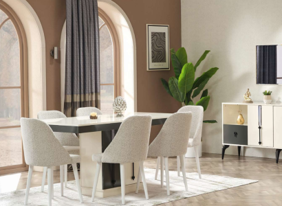 Ylellinen ruokailuryhmä, jossa on pöytä ja 6 suunnittelijan tuolia