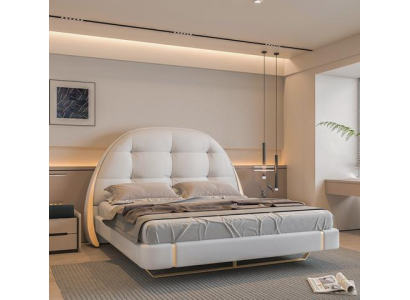 Ylellinen harmaa sänky kultaisilla yksityiskohdilla modernilla muotoilulla pyöreällä päädyllä