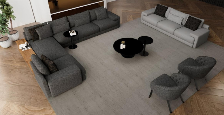 Tyylikäs kulmasohva kahdella nojatuolilla, jossa on suunnittelun ja mukavuuden harmonia