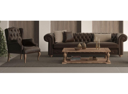 Sohva, jossa on nojatuoli moderniin ja mukavaan huoneeseen ilman liioittelua