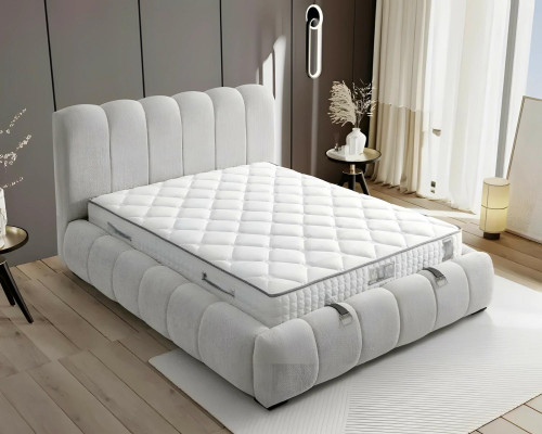 Moderni valkoinen tekstiilivuode laadukkaalla patjalla