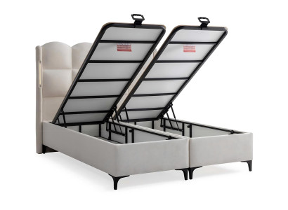 Tyylikäs valkoinen sänky modernilla patjalla