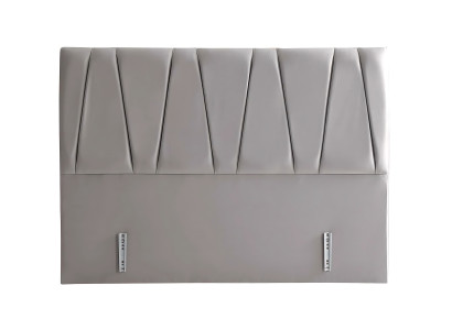 Tyylikäs harmaa sänky patjalla modernissa tyylissä