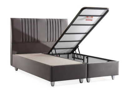 Harmaa tekstiilivuode modernilla patjalla