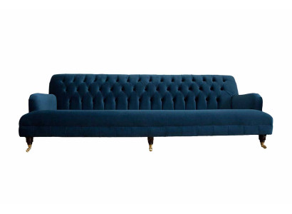Ylellinen muotoilijasohva Chesterfield-tyylissä neljällä istuinpaikalla sinisessä väriä