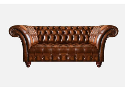 Ylellinen Chesterfield-sohva ruskeana olohuoneeseen nahkaverhoiltuna